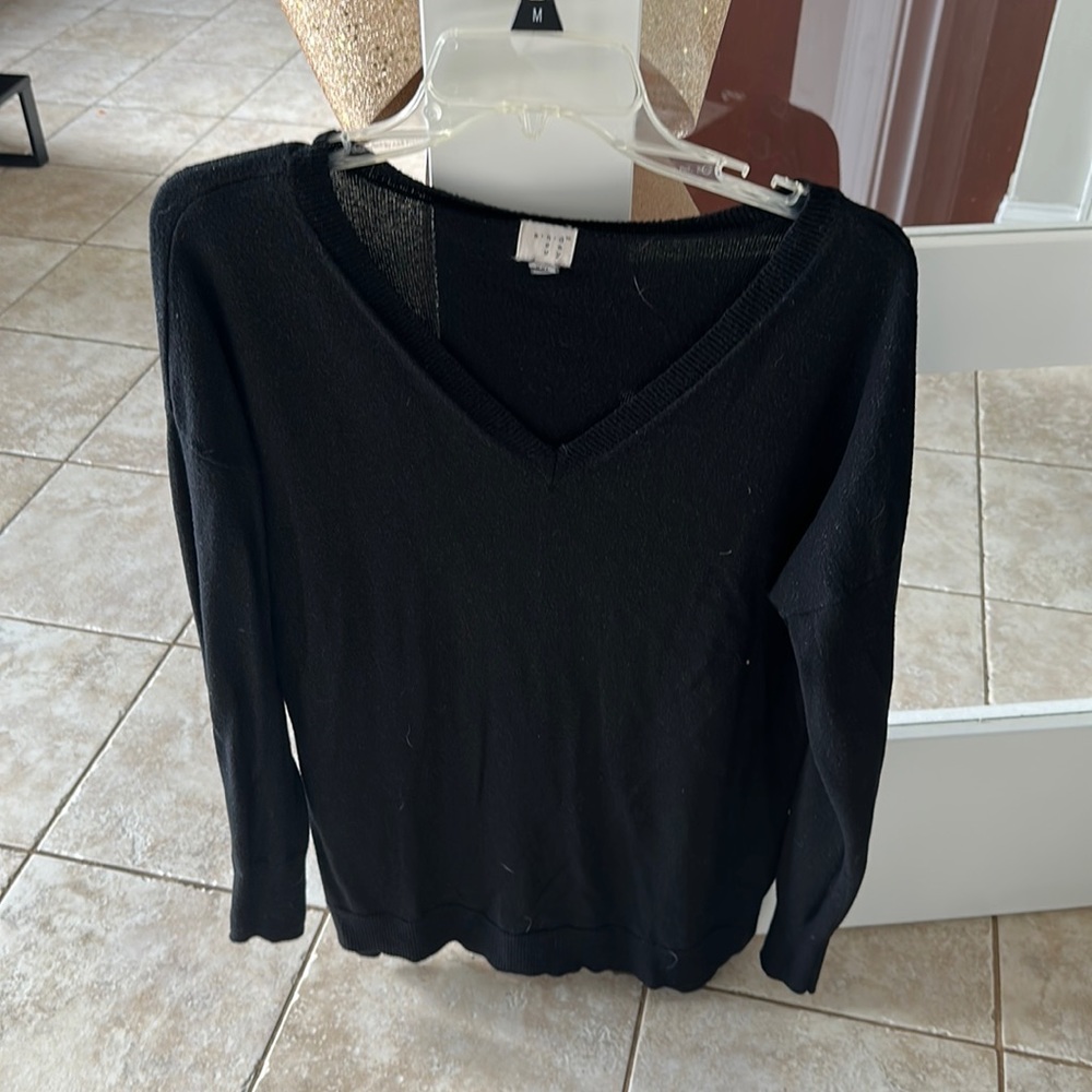A new day black sweater with sparkle thread throughout
